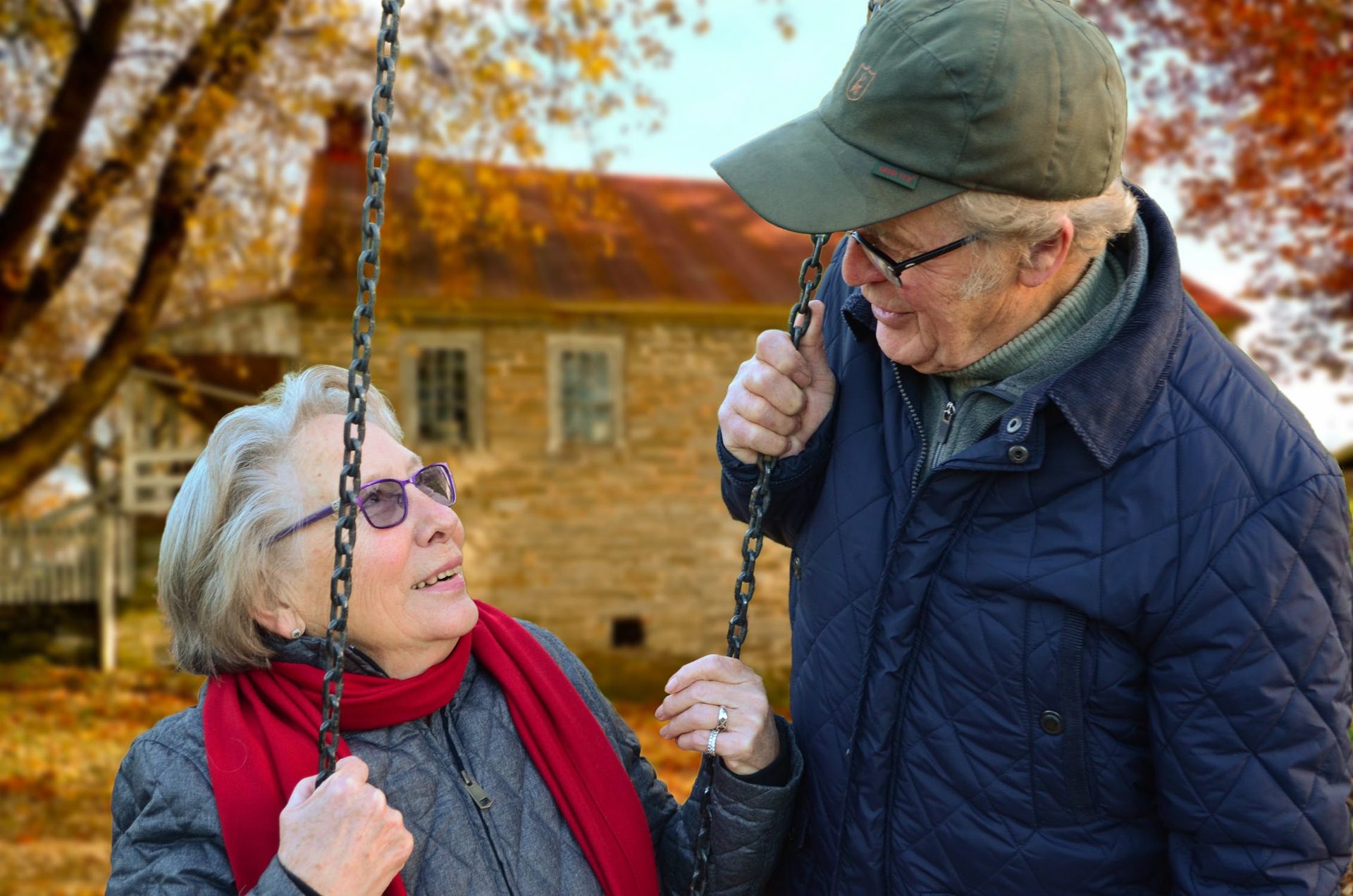Older couple smiling together outdoors